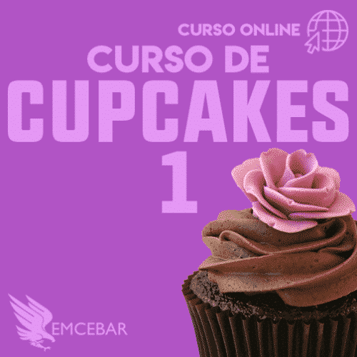 Un cupcake con las palabras "Curso de Cupcakes 1" escritas en la parte superior.